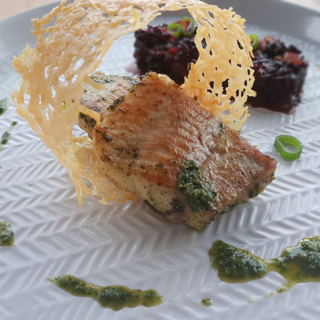 Catfish mit schwarzem Risotto